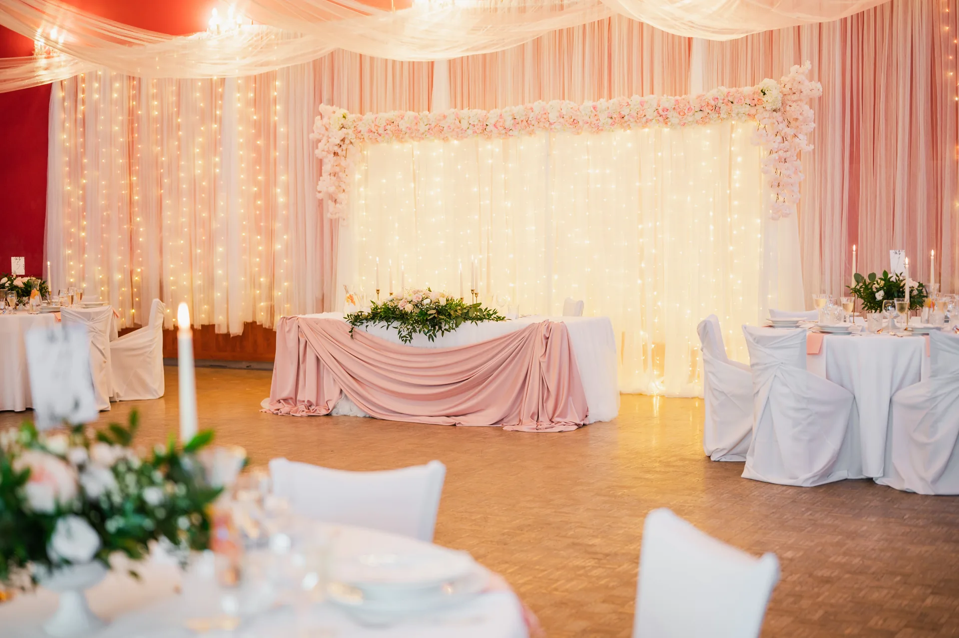 Wedding hall decorated in pink and white